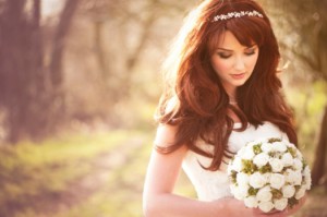 Beautiful bride outdoors in a forest.