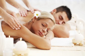 Beautiful couple enjoying in the back massage.